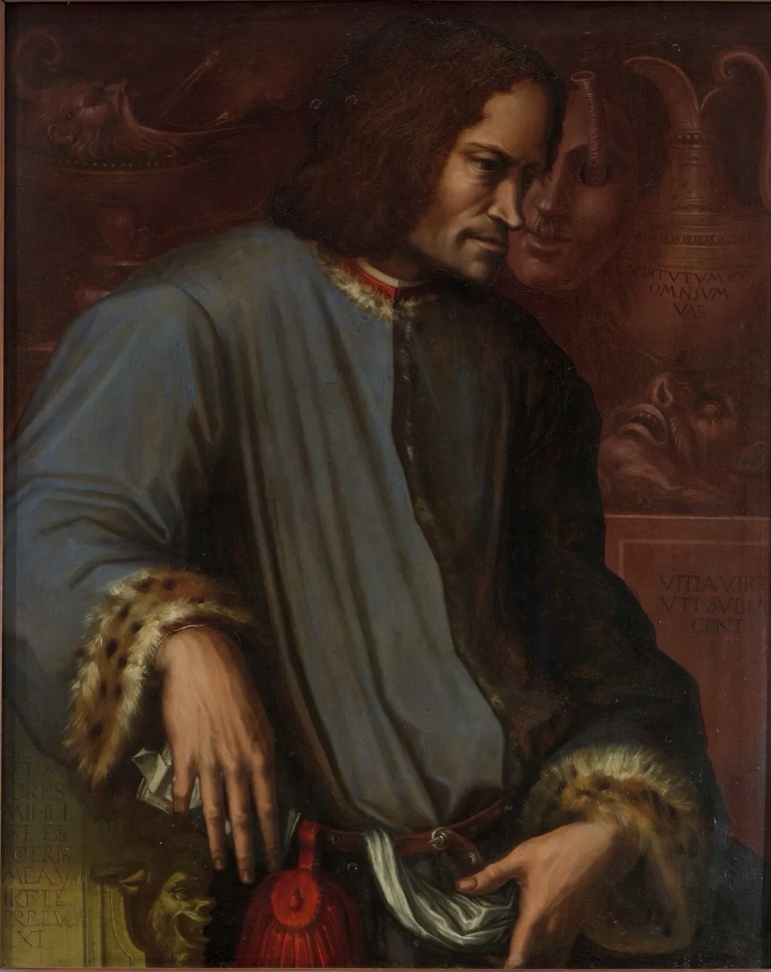 Portrait of Lorenzo de’ Medici in a blue robe trimmed with fur, standing beside a carved pedestal.